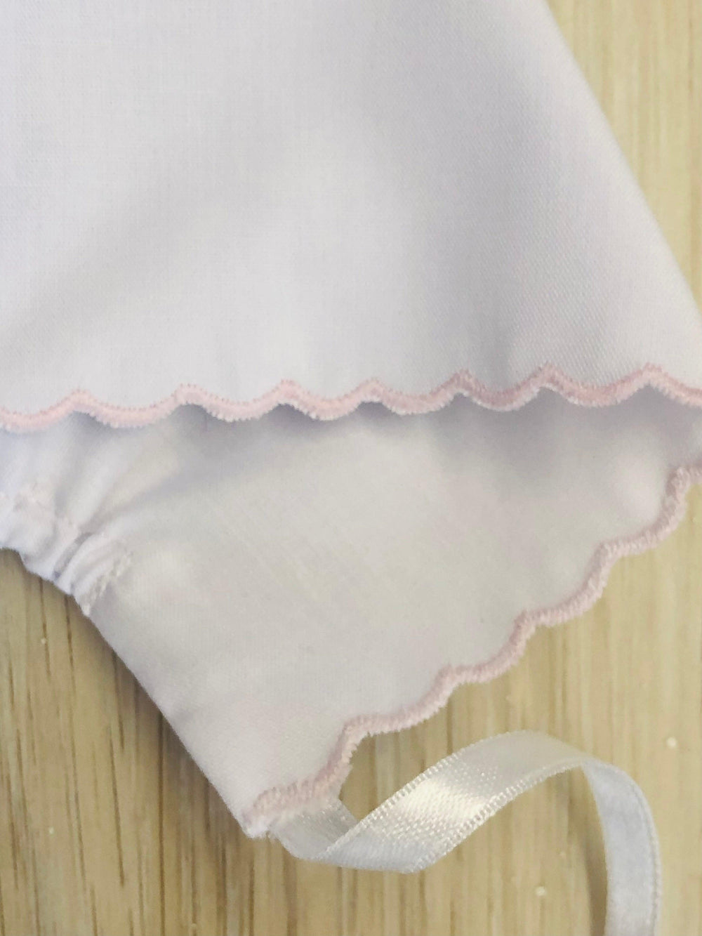 White baby hat with pink scallop trim - The Orange Iris 